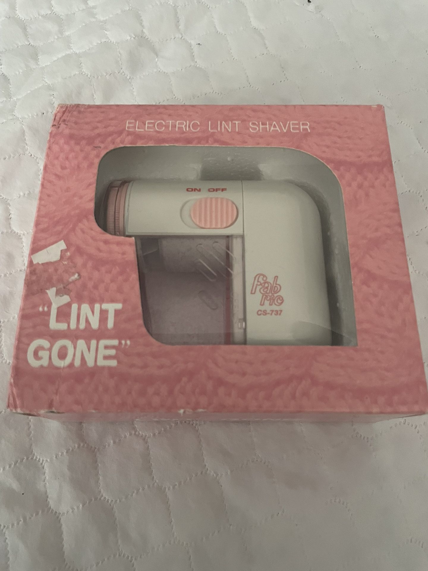 electric lint shaver- lint gone- cs-737- in pink and white