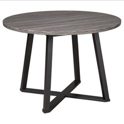 Ashley Round Dining table - $179