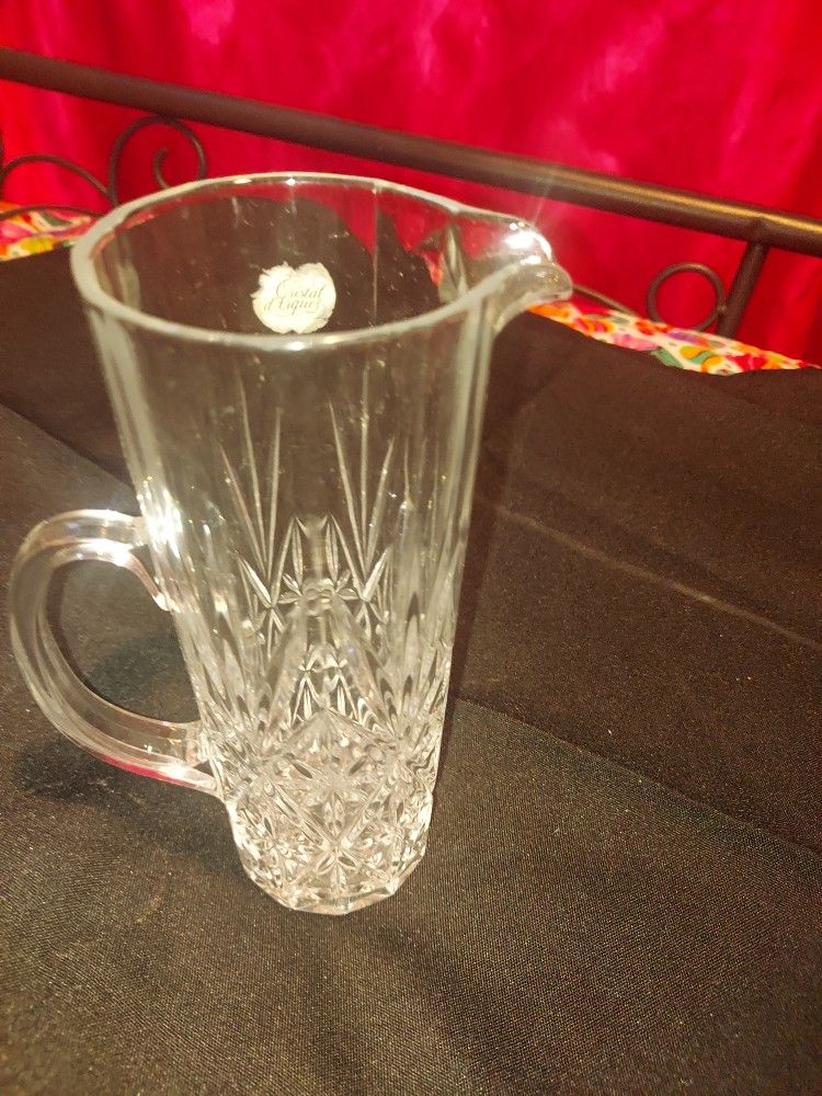 CRYSTAL PITCHER, CANDLE HOLDERS AND VASE $15.00