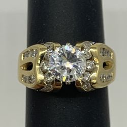 Engagement ring with a CZ Center and 0.50 TCW Real diamond accents in solid 14k yellow gold Size 6.5