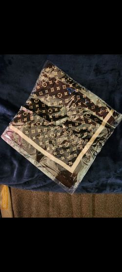 This item is a Louis Vuitton silk monogram pocket square