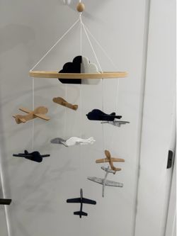 Airplane nursery mobile with wood stand