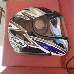 Two Large Motorcycle Helmets