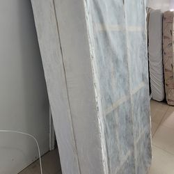 King size box spring and metal frame.