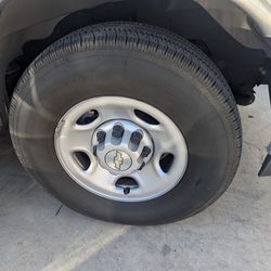 LT245-75-16 Bridgestone V-Steel 10 Ply Tires, Only 5000 Miles, With Factory 8 Lug Wheels, Center Caps And Lug nuts. No Patches, Like Brand New.