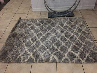 Light gray/beige interior rug 150”x210”
