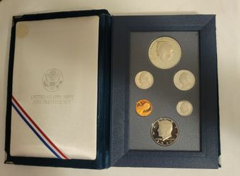 United States Mint Proof Set from 1990, containing coins with a polished, mirror-like finish.