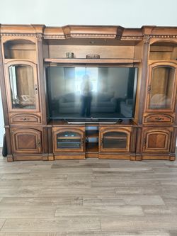 Entertainment center & two end tables.