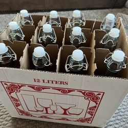 12 Glass Bottles with Attached Plastic Caps