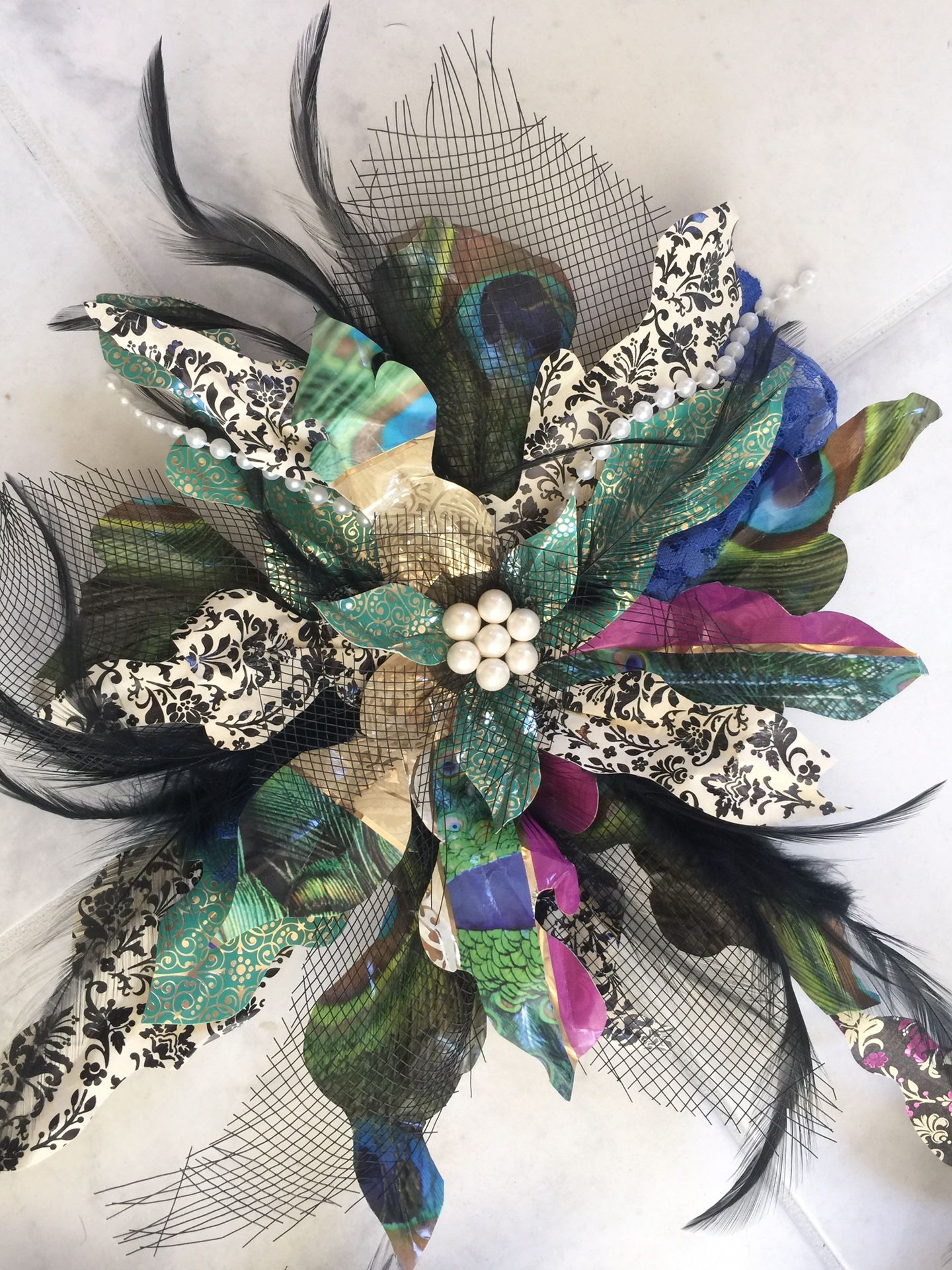 Decorations. Party. Feather. Pearl. Paper pinwheels