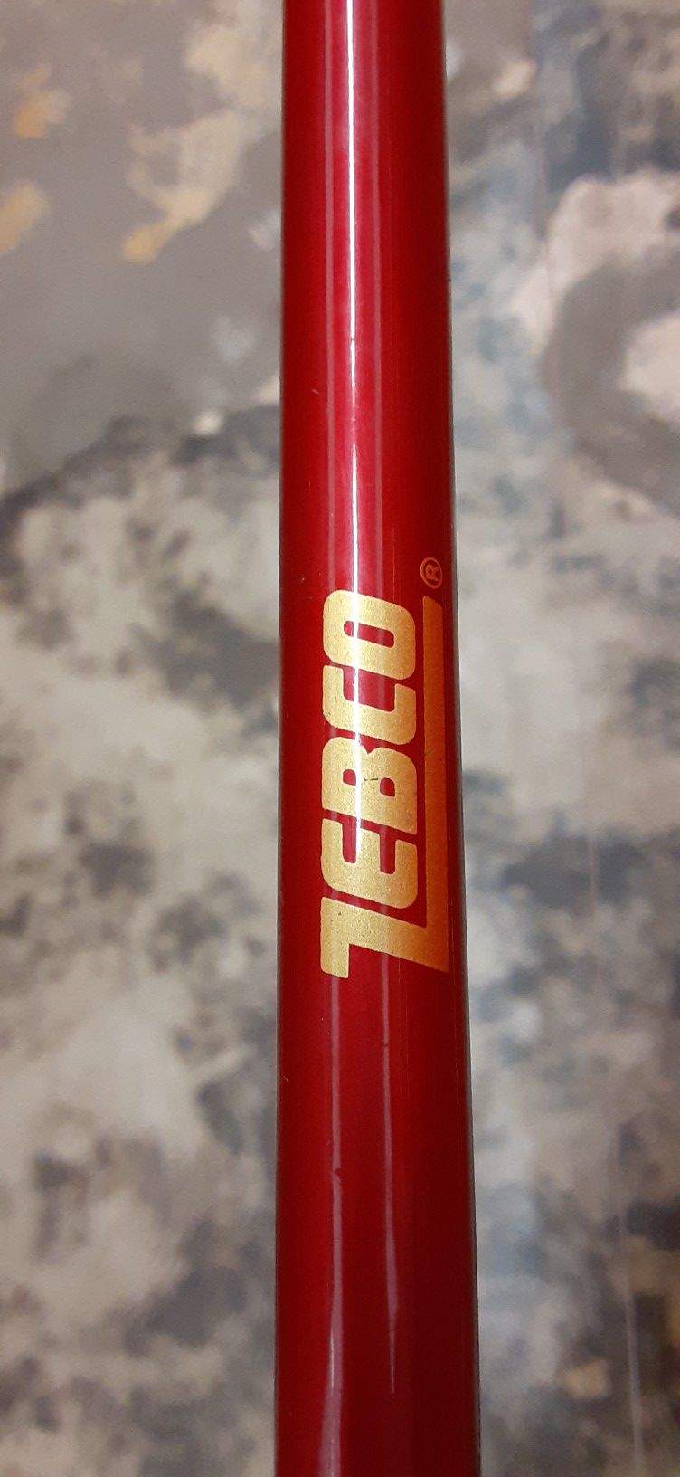 "Zebco" 8' two piece fishing pole with a long cast reel
