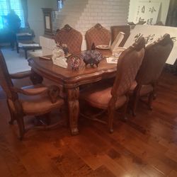 Formal dining room table with six chairs