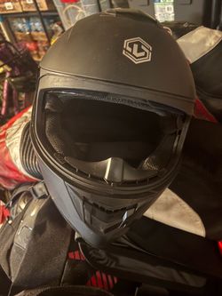 2 large motorcycle helmets