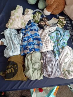 6 month baby boy onsies + 4 pairs of brand new socks