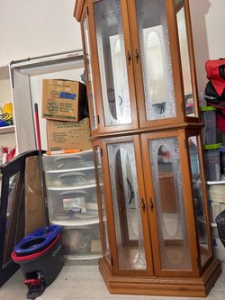 Cabinet with light and glass and mirror shelves