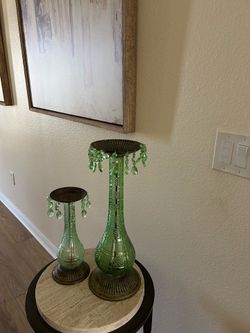 2 Green Glass Candle Holders- 20 inches and 12 inches.
