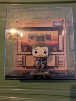 Albums Marvel Guardians of the Galaxy Awesome Mix Vol. 1 Vinyl Figure Star-Lord #53 inside a protective display case