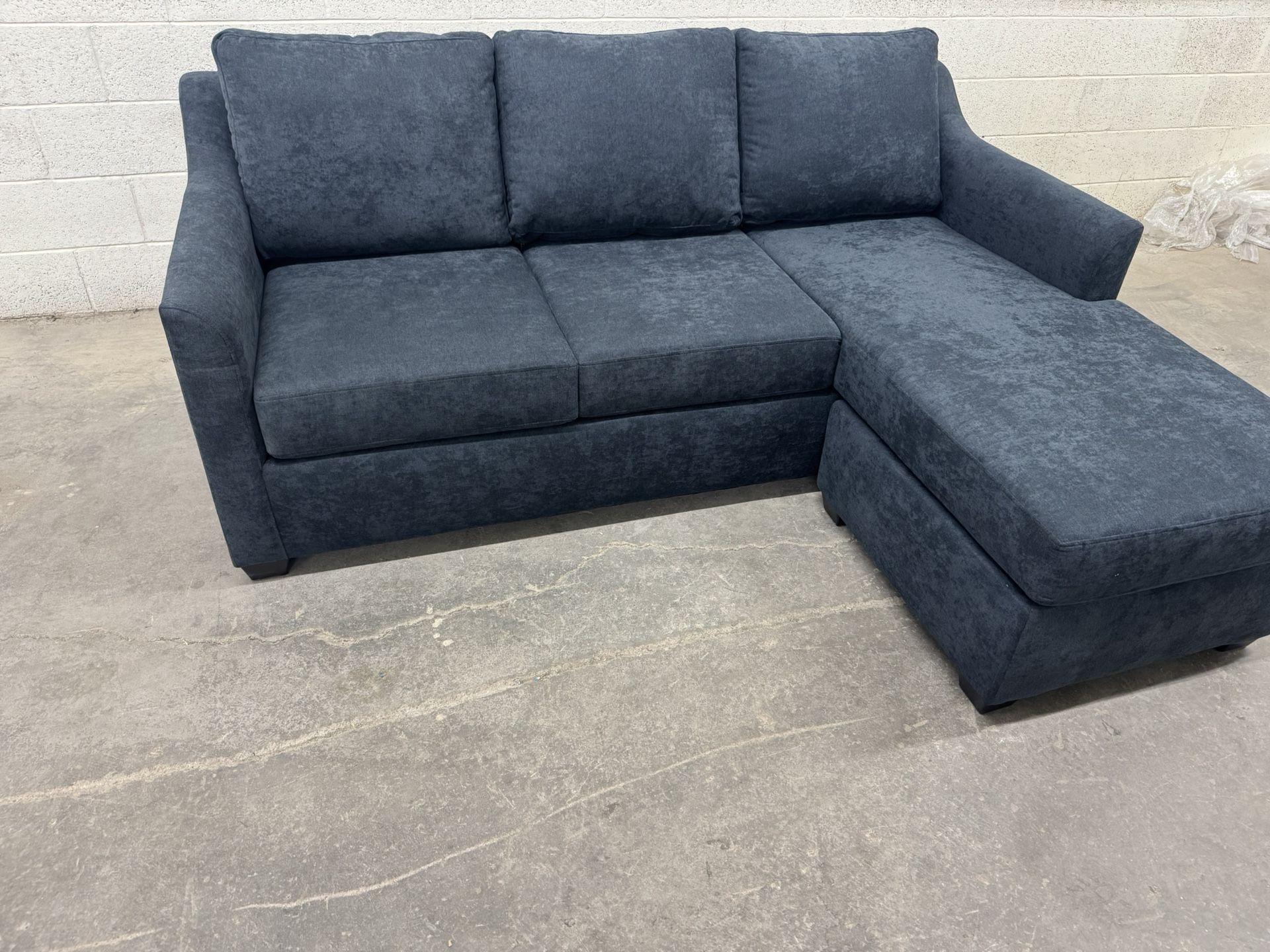 Free Delivery* Brand New Living Spaces Sofa W/ Reversible Chaise