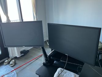 Dual gaming monitor set up with wall and desk mount