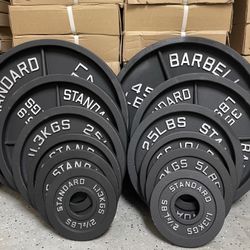 Cast Iron Olympic weights 245 Lb Set Brand New Still In The Box  2-45,s 2-35's 2-25's 2-10's 2-5's  2-2.5's 