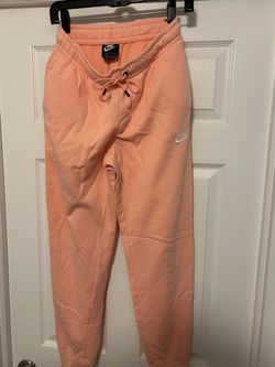 Nike women peach/pink color sweatpants size small new
