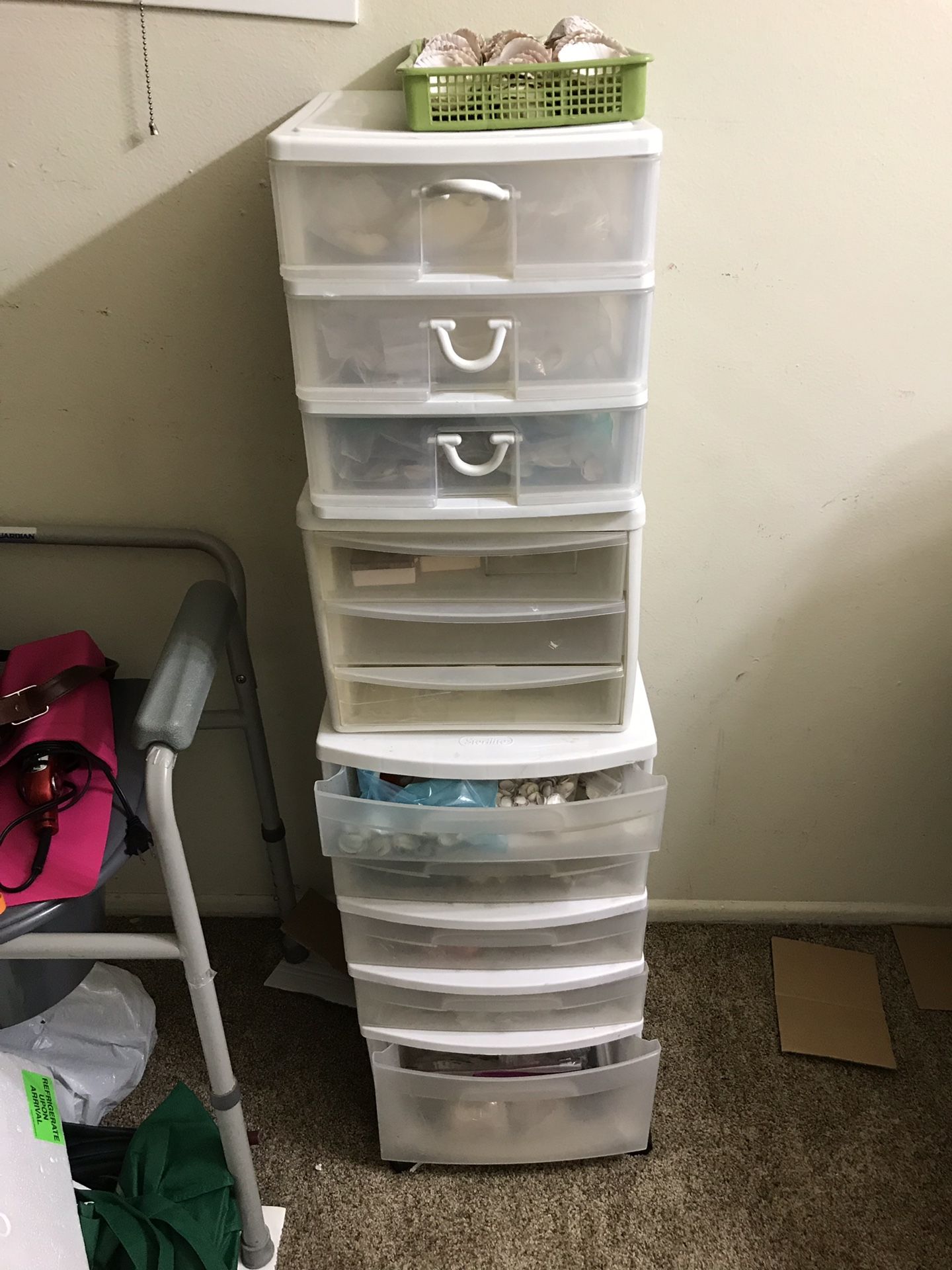 3 plastic drawers with shells