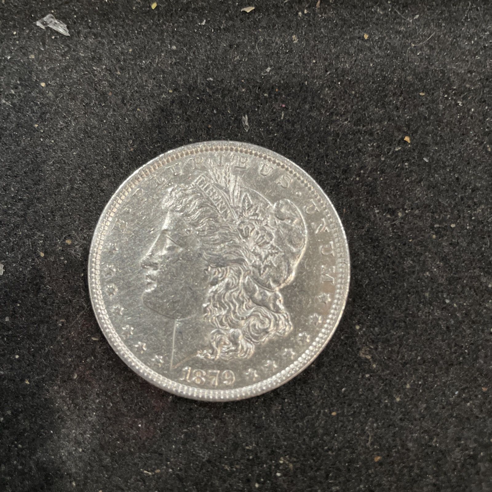 1879 Silver A/U Morgan Dollar In A Slightly Circulated Condition 271