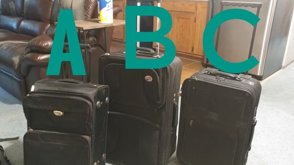 black rolling carry on luggage