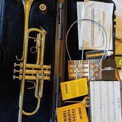 Bach Trumpet With Locking Hard Case, Mouthpiece, Music Stand, and all Accessories. 