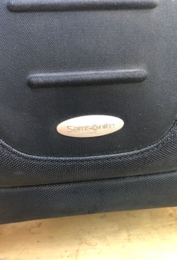 Samsonite carry on bag.