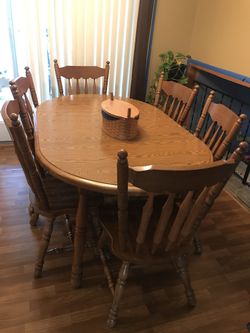 Table & chairs. Little wear on one leg. Must pick up!!!!!