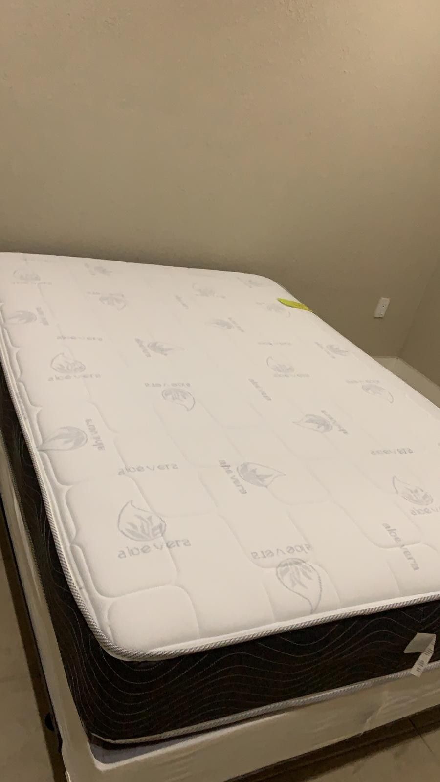 New full mattress and box spring 2 pc. Bed frame is not included