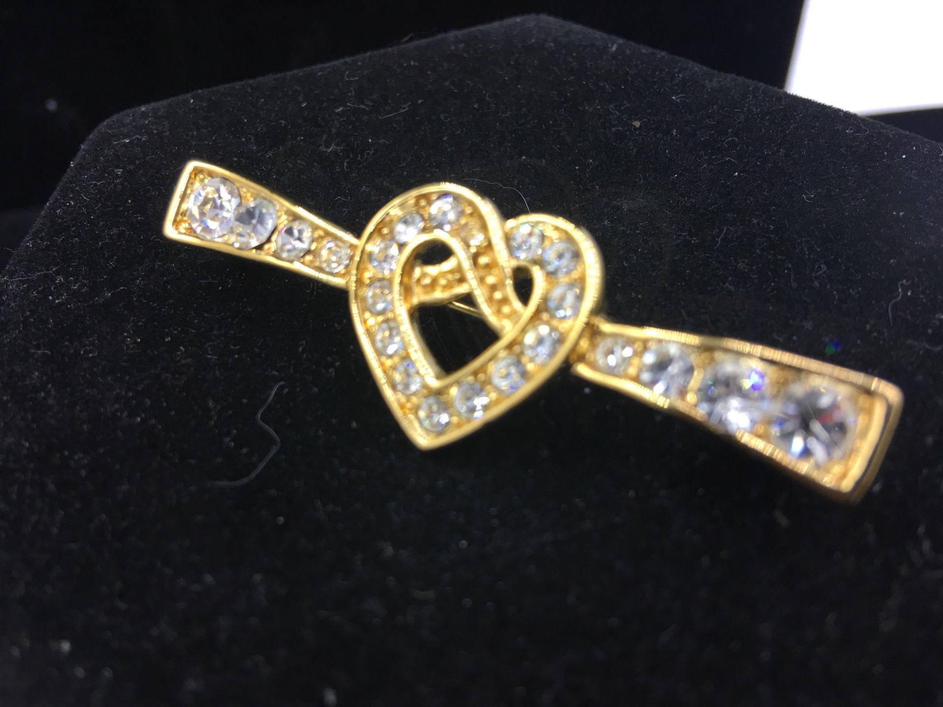 Vintage Gold toned heart shaped bar brooch with rhinestone