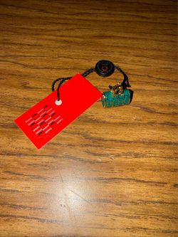 Carolina Herrera charms