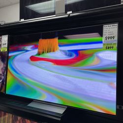 LG OLED 65 inch 4K Smart TV with Amazing Color and Detail! Includes Store Warranty And Financing!