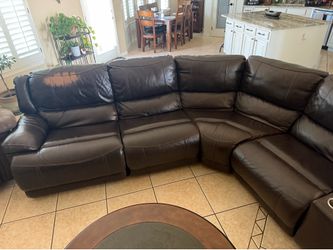 Brown leather sectional sofa