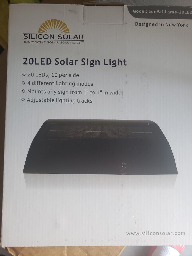 Solar panel for real estate sign