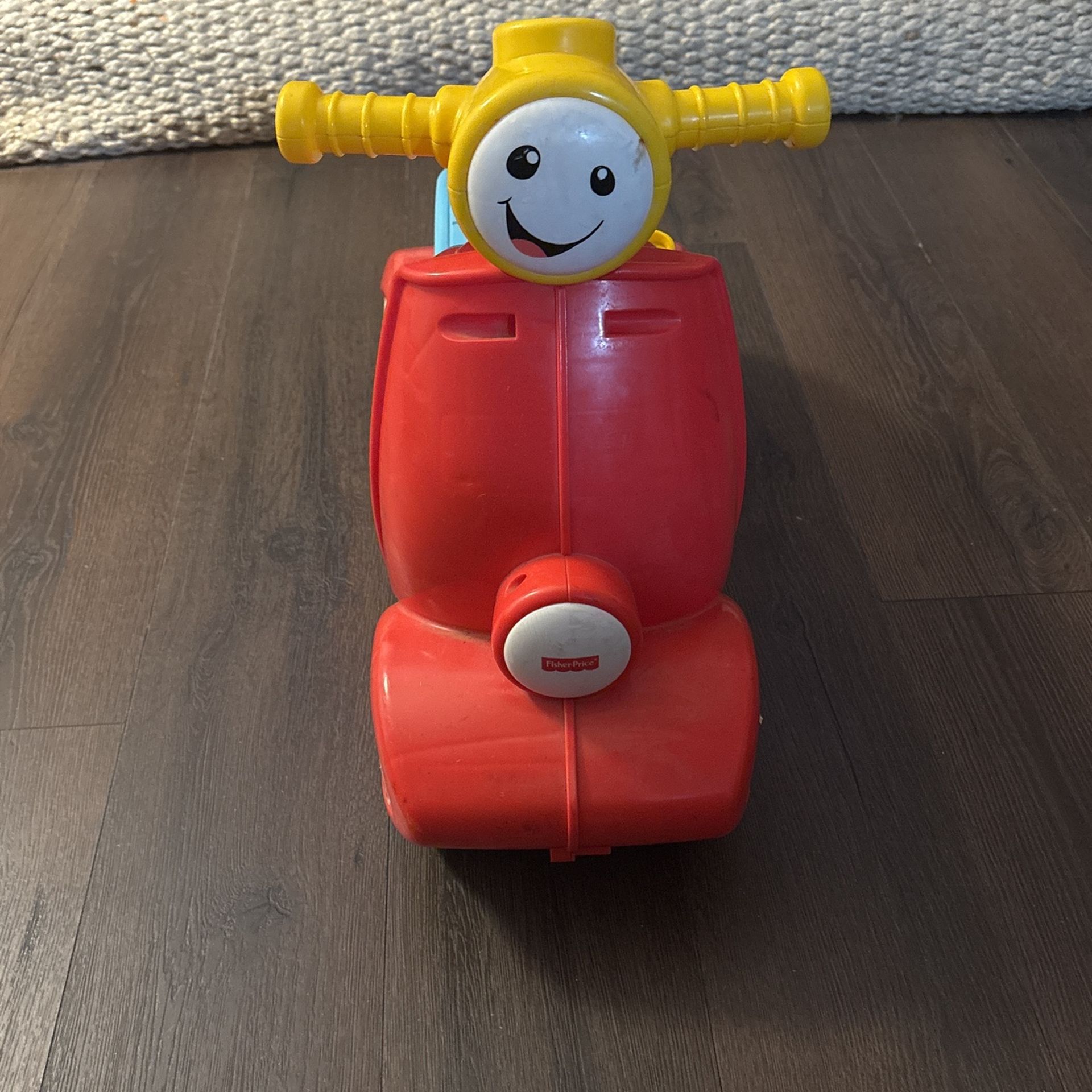 Fisher price Scooter.