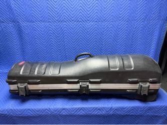 SKB gold travel case clubs