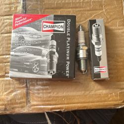 New Spark Plugs Box Of 4 Plugs 
