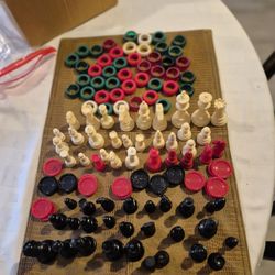 Chess checkers and other board game pieces