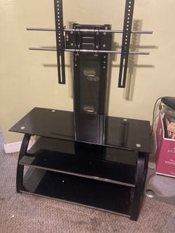 Swivel TV stand black glass