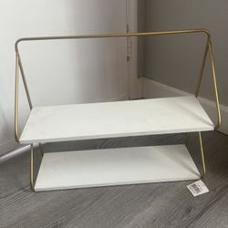 White And Gold Shelf
