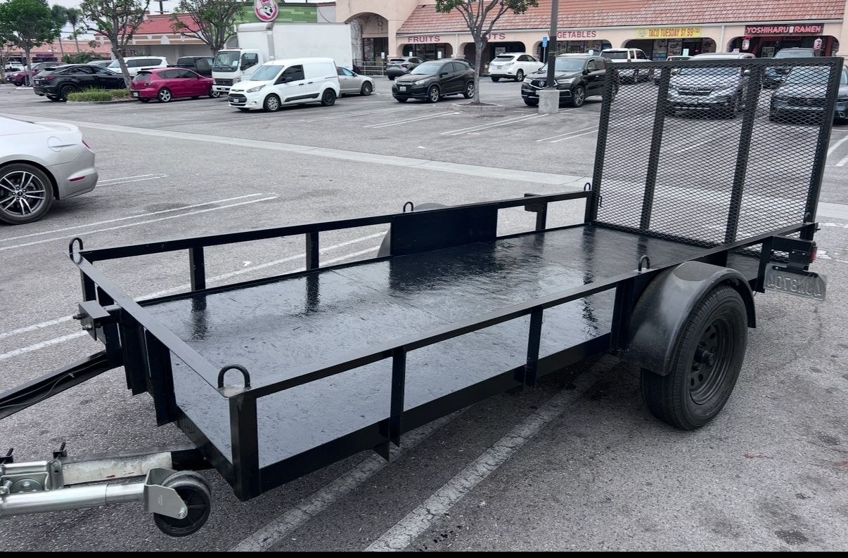 12ft Utility trailer With ramp and tool box storage