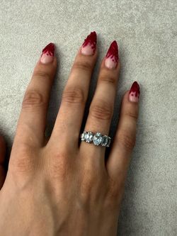 Genuine 2.5 carat oval aquamarines, band ring 10 K white gold size 6