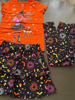 3-piece Halloween-themed outfit for girls (size L): blouse, skirt, and leggings.