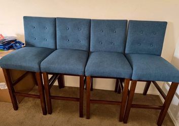 4 Blue Tufted Bar Stools