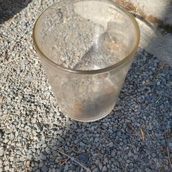 Thick glass plant pot 14 in tall 11 in diameter 

Good condition. Could be used for other things like full of marbles or something decorative. Candy?