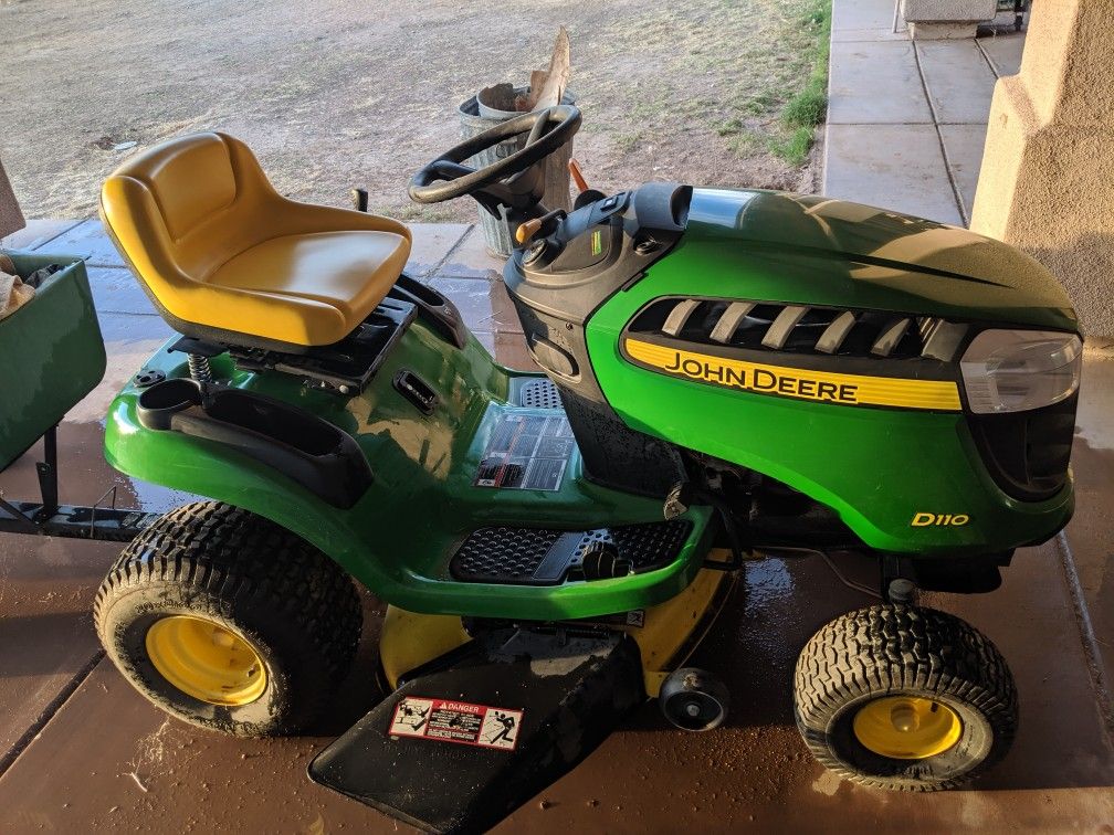 John Deere D110 riding lawn mower