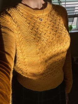 Yellow cable knit sweater
